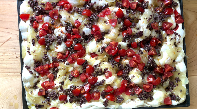 Unbaked pissaladière, ready for the oven.