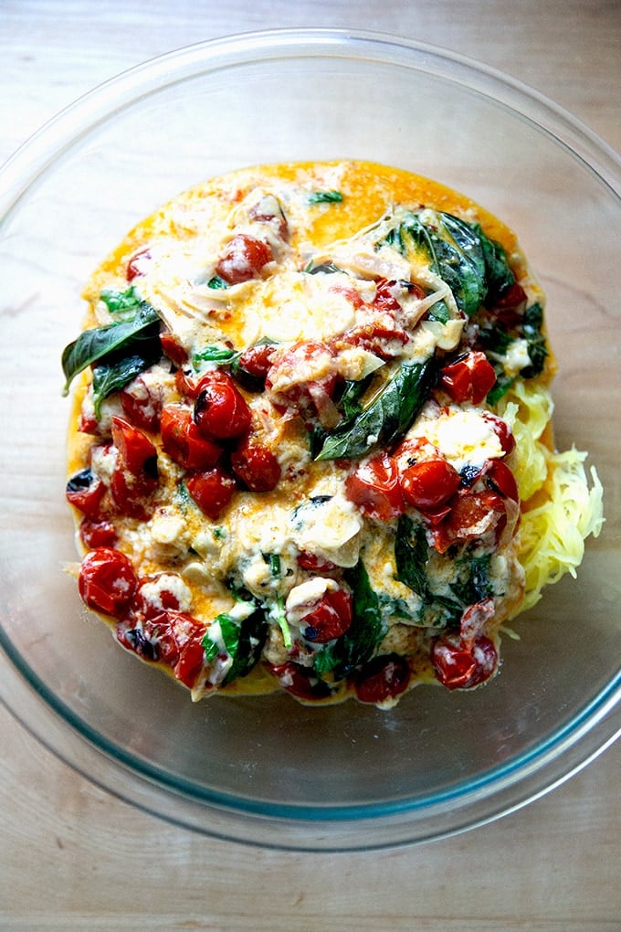 Spaghetti squash tossed with baked feta and tomatoes. 