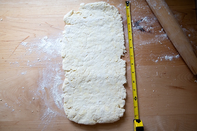 Biscuit dough rolled out to 14 inches long.