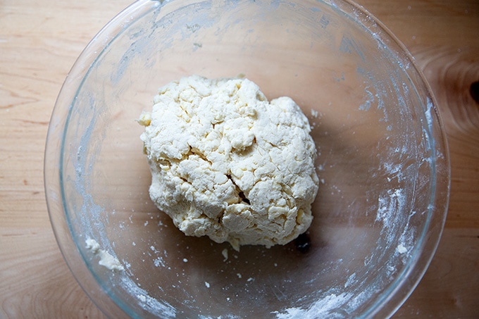 Mixed biscuit dough in a bowl.