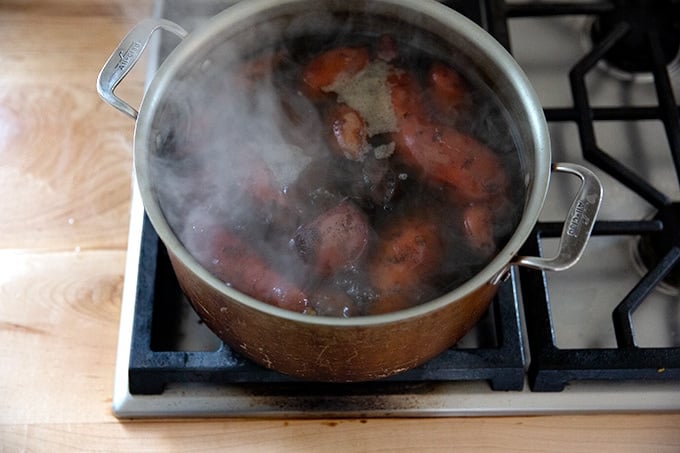 Boiled sweet potatoes in a pot on the stovetop.