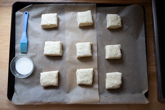 Cut biscuits on a sheet pan.