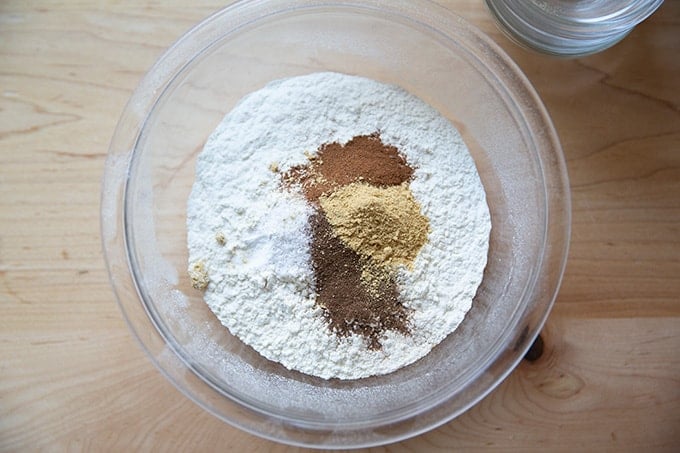 The dry ingredients to make molasses cookies in a large bowl.