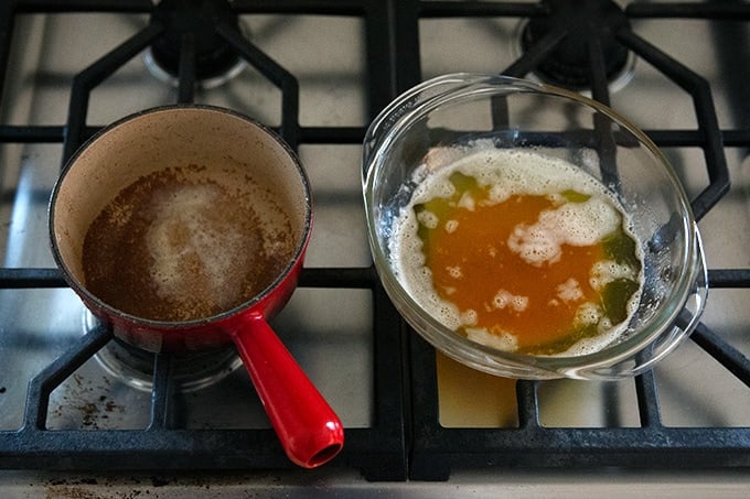 Brown butter in a bowl on a stovetop.