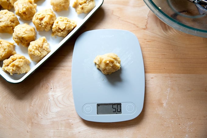 A portioned 50-gram snickerdoodle dough ball.