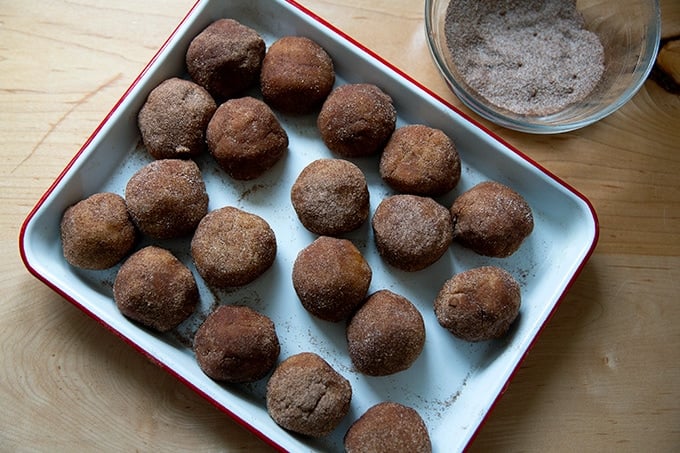Rolled snickerdoodle dough balls.