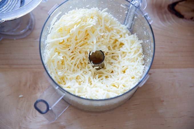 Grated cheese in the food processor.