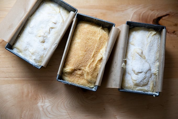 Three mini loaves of pound cake ready for the oven.