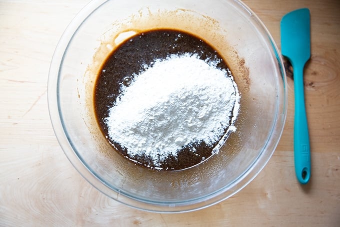 A bowl of gingersnap cookie batter.