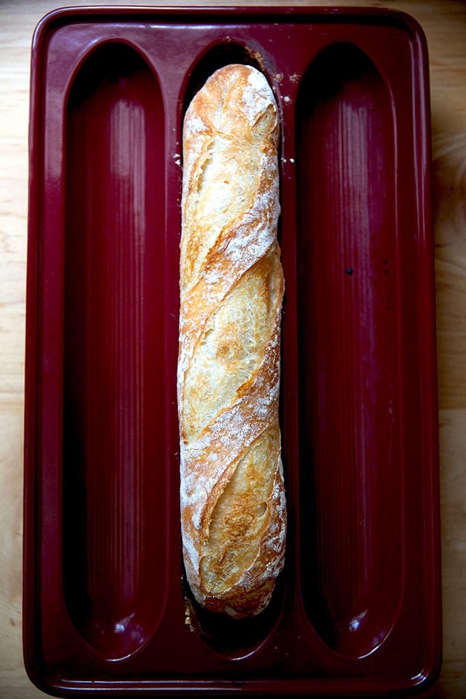 One baguette in an Emile Henry baguette baker.