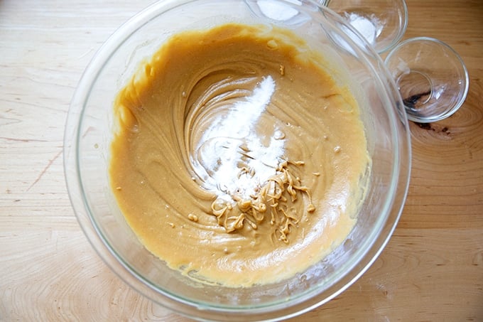 Peanut butter cookie batter with baking powder just added.