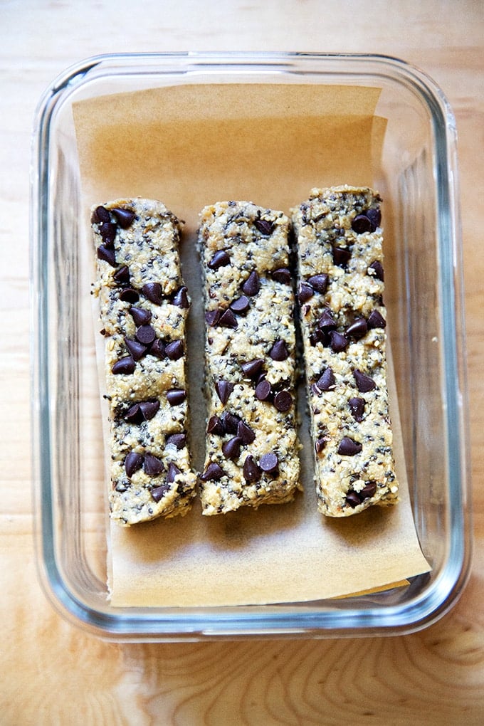 No-bake granola bars in a storage vessel.