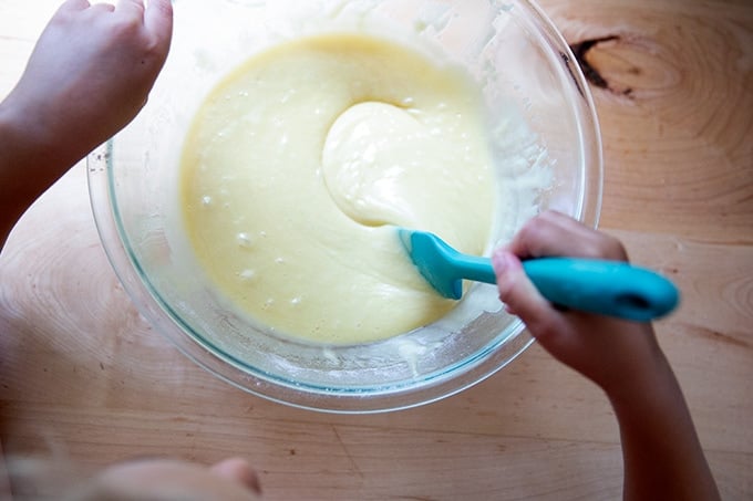 Mixing the one-bowl birthday cake in a large bowl.