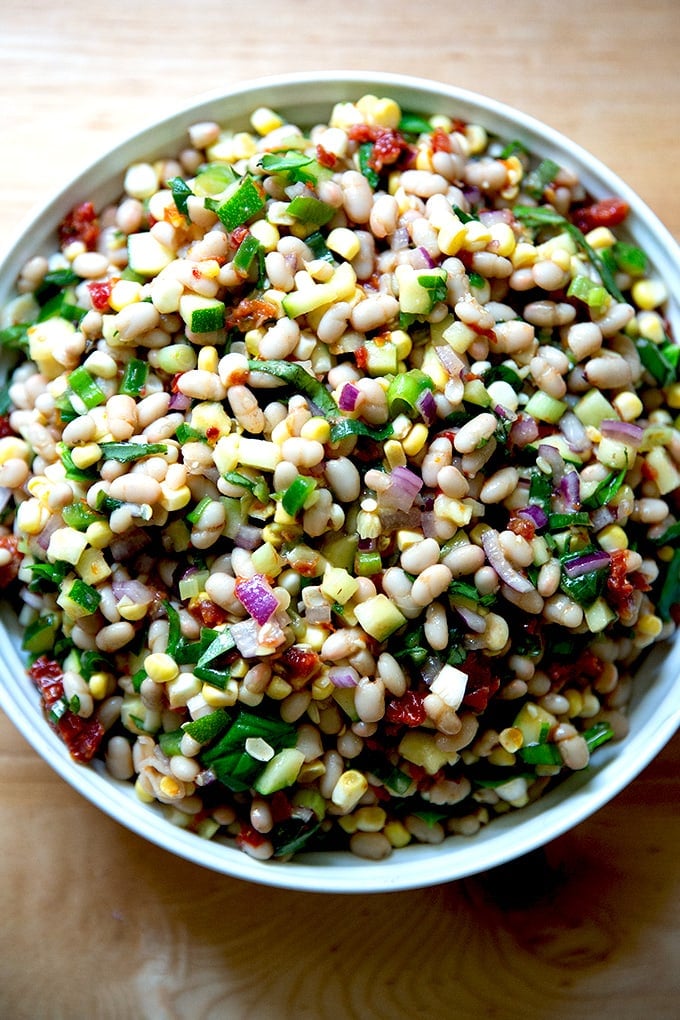 A bean salad in a serving bowl.