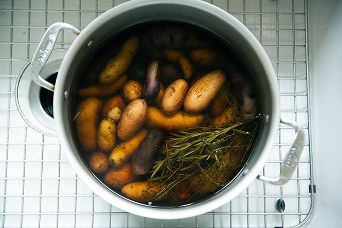 A pot of cooled fingerling potatoes.