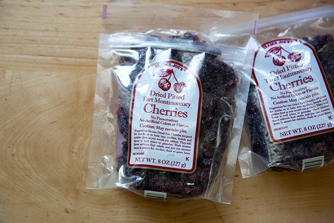 Two bags of dried cherries.