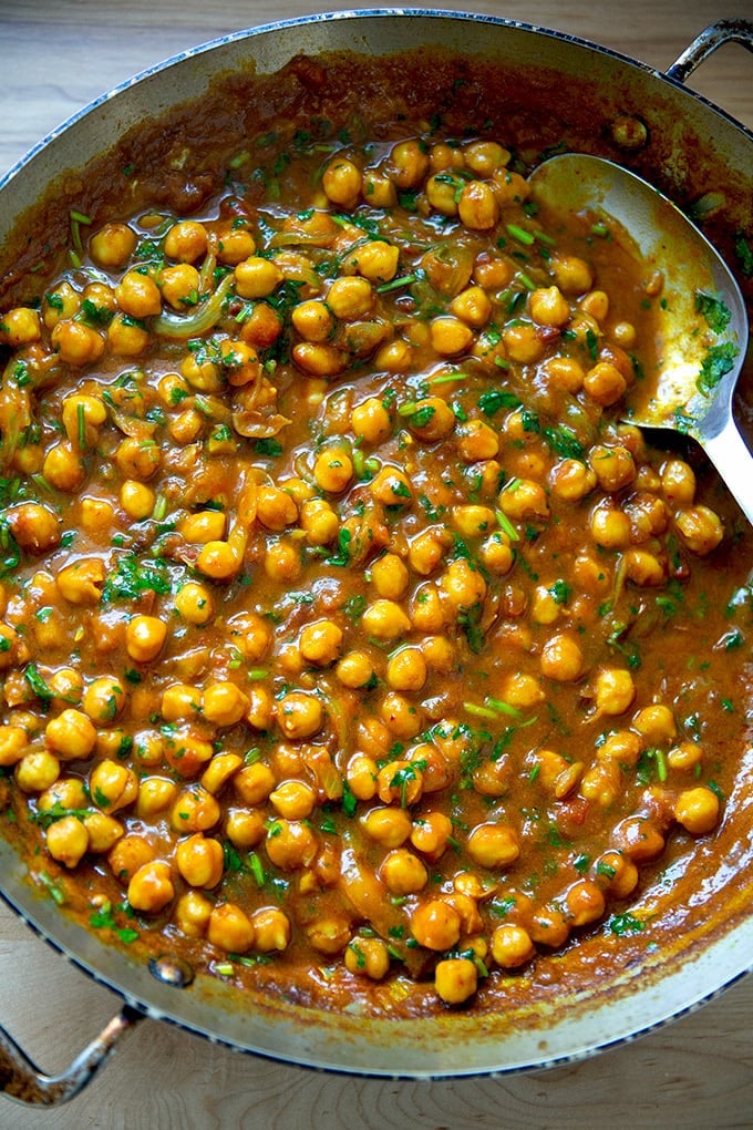 A skillet filled with just-cooked curried Thai chickpeas.
