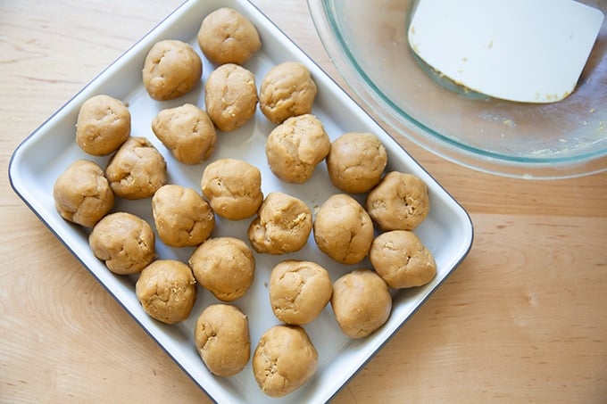 A small tray holding peanut butter cookie dough balls.
