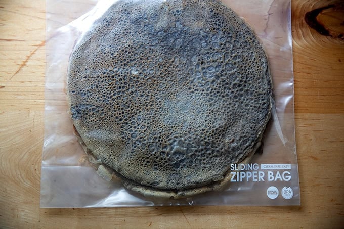 A large zip-top bag filled with buckwheat crepes.
