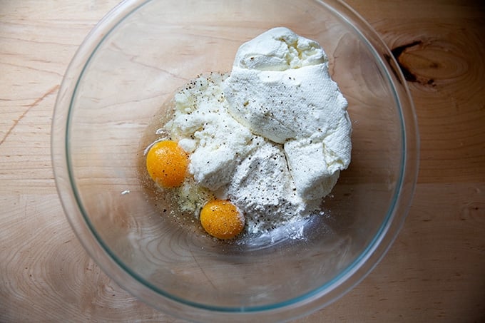 Ingredients to make ricotta gnocchi in a bowl.