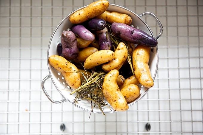 Drained fingerling potatoes in a colander.