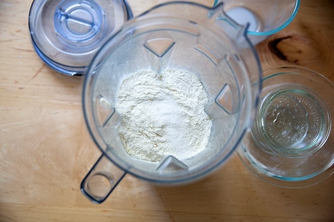 Ingredients to make popovers in a blender.