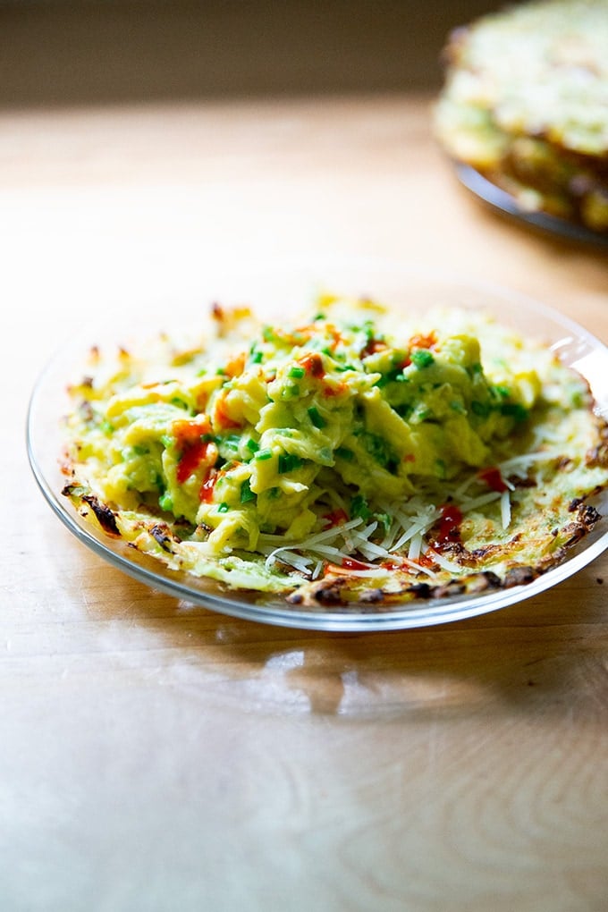 A cabbage tortilla filled with eggs, cheese, and hot sauce.