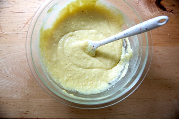 A bowl of mixed lemon-blueberry quick bread batter without the blueberries.