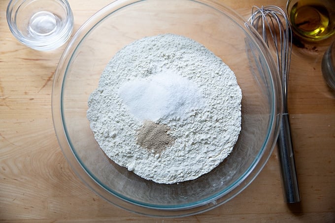 Flour, salt, sugar, and instant yeast in a large bowl.