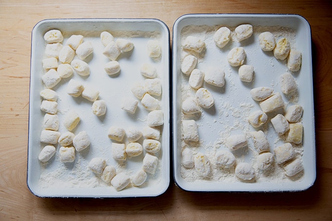 Cut ricotta gnocchi on two small sheet pans.