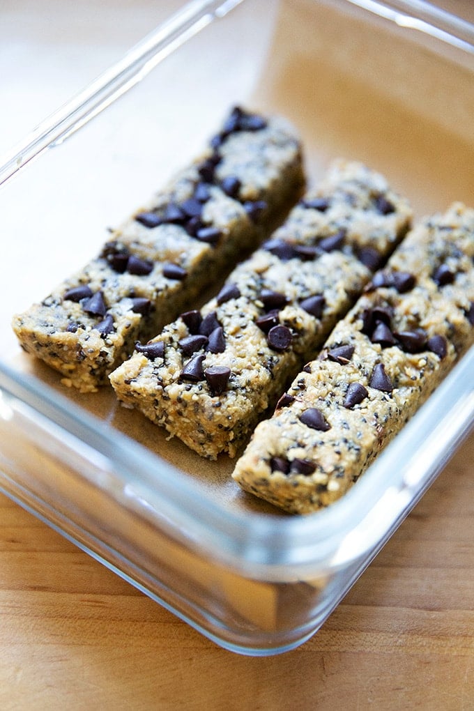 No-bake granola bars in a storage vessel.