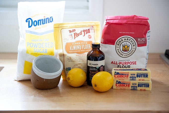 Ingredients to make lemon-almond snowball cookies. 