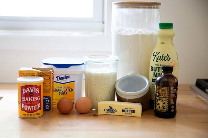 The ingredients to make sourdough discard pancakes on a countertop.