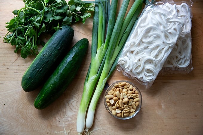 Ingredients to make peanut noodle salad on the counter top.