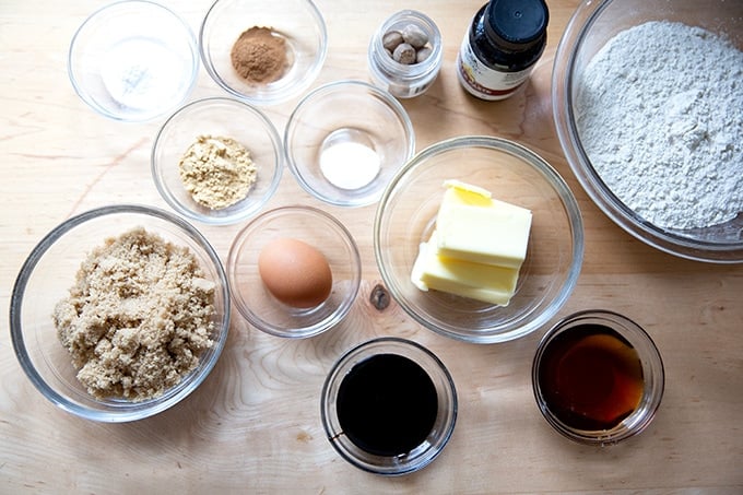 Ingredients to make gingersnap cookies on a countertop.