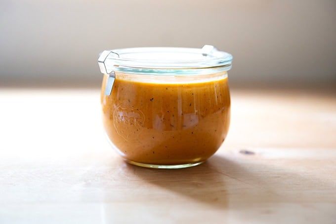 A jar of roasted red pepper dressing. - 8