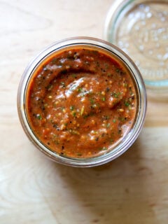 A jar of blistered tomato salsa.