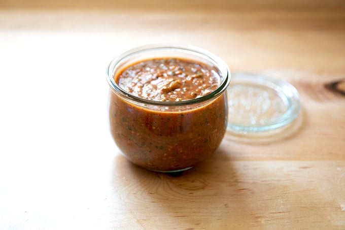 A jar of blistered tomato salsa. - 9