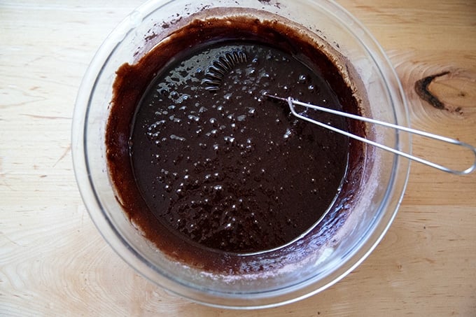 A bowl of whisked together brownie batter.