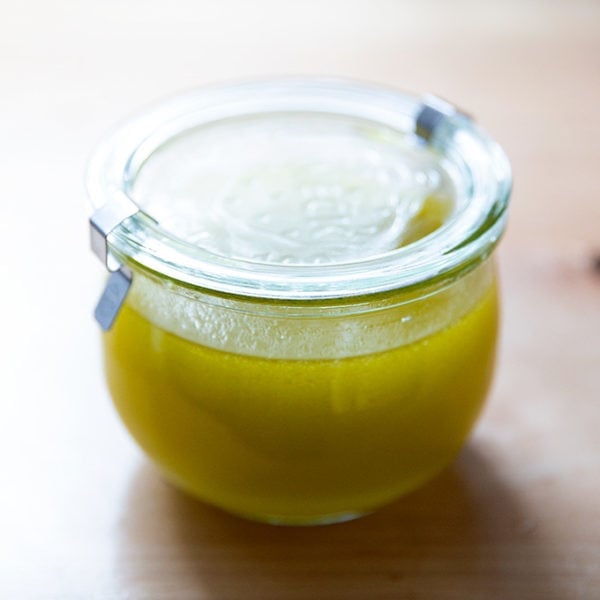 A jar of lemon vinaigrette.