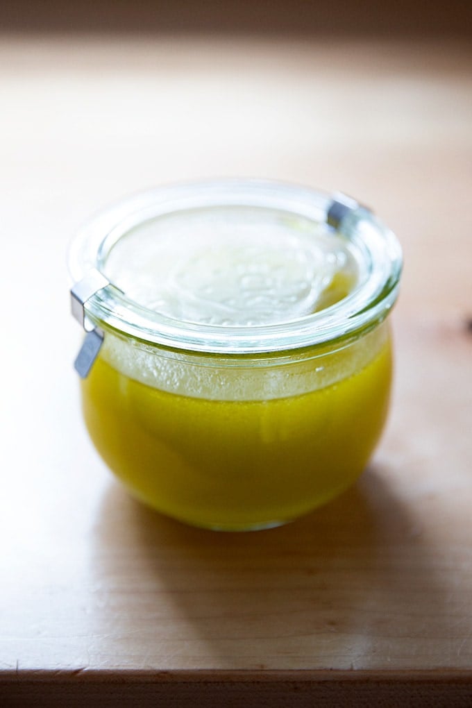 A jar of lemon vinaigrette.