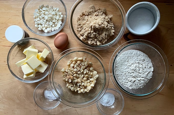 Measured ingredients to make white chocolate macadamia nut cookies.