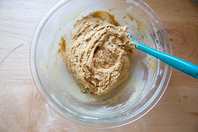 A bowl filled with peanut butter cookie dough, just mixed.