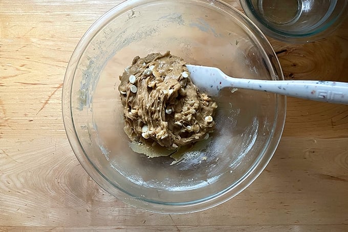 Mixed together white chocolate and macadamia nut cookie batter.