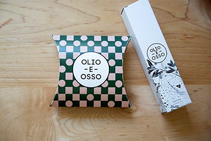 Two small boxes of Olio E Osso products.