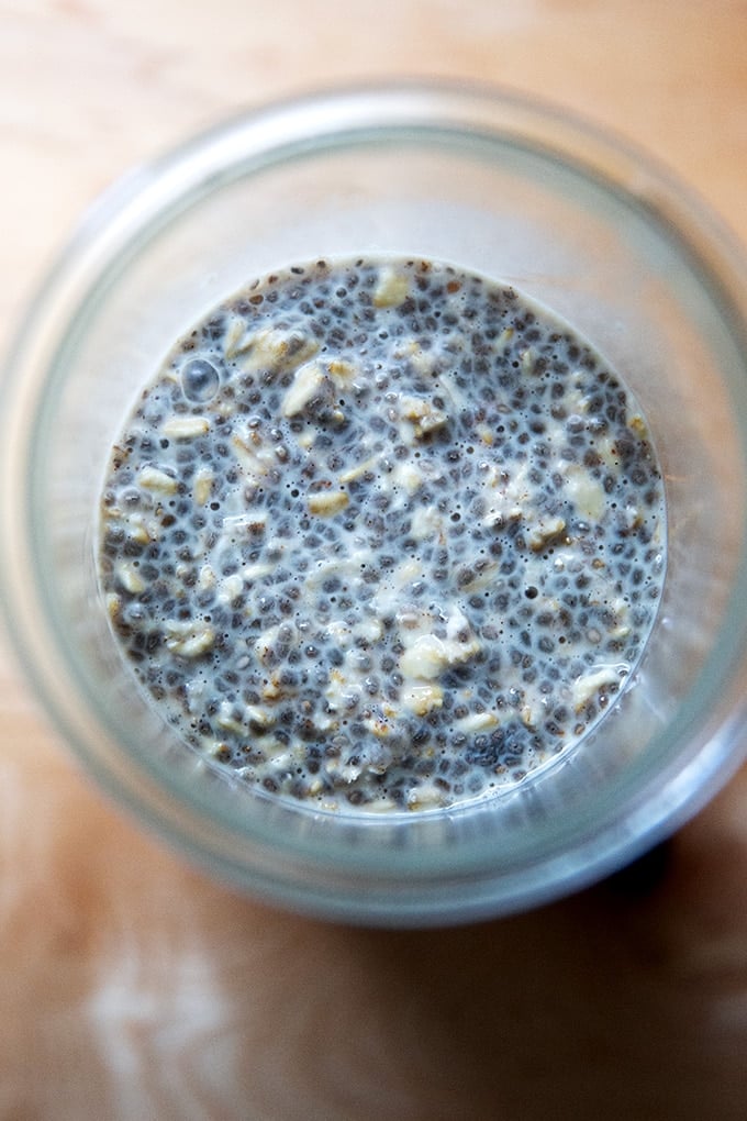 An overhead shot of a Weck jar filled with overnight chia oats, ready to eat.