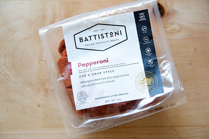 Battistoni pepperoni in a bag on the counter.