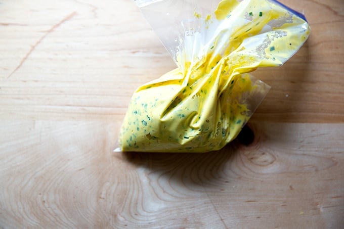 A piping bag filled with the deviled egg egg-yolk filling.