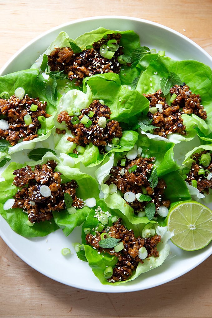 A plate of miso-lime tofu crumbles in lettuce cups.