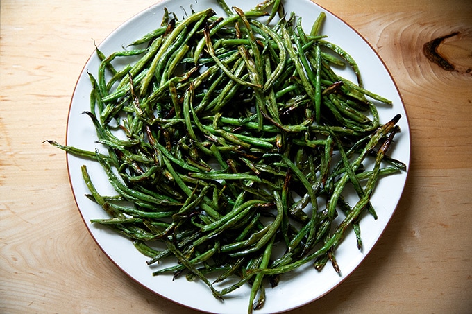 A platter of roasted green beans.